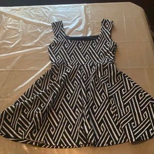 Peplum pattern dress; small/medium sized
